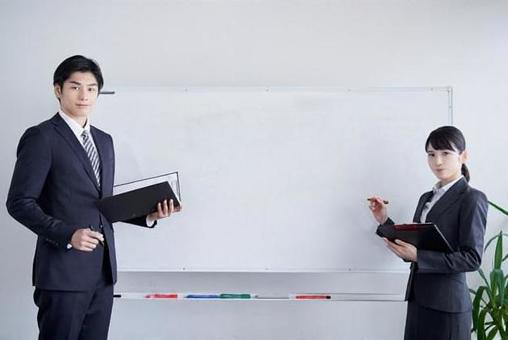 A Japanese business person who explains using a whiteboard for text composition, copy space, text space, blank, JPG