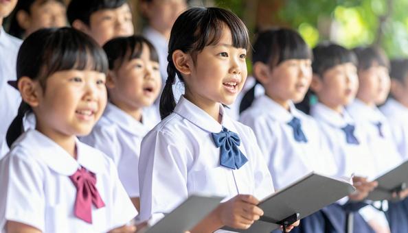 合唱 歌う日本人の小学生たち 合唱 歌う日本人の小学生たちの写真