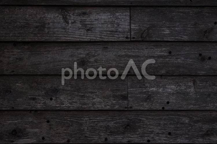 傷のある黒い木目の背景画像 黒,木目,黒い木目の写真素材