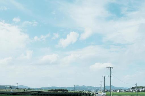 広がる田園と夏の静かな午後 広がる田園と夏の静かな午後の写真