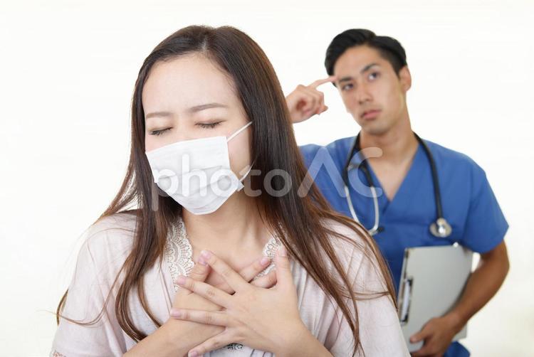 体調不良の女性と男性医師 女性,風邪,インフルエンザの写真素材