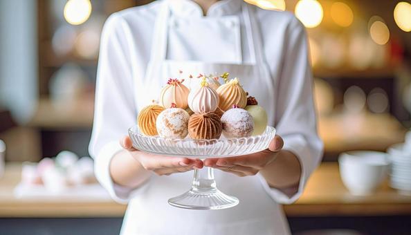 美しいスイーツとパティシエの写真