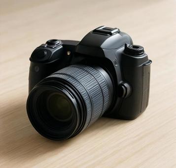明るい木目テーブルに置かれた黒い一眼レフ 明るい木目テーブルに置かれた黒い一眼レフの写真