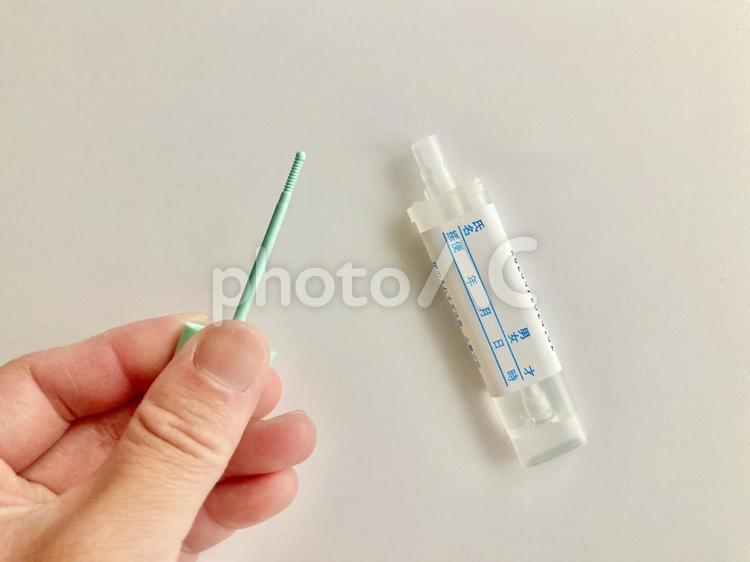 健康診断・検便を取る・使用方法イメージ 検便,スティック,容器の写真素材
