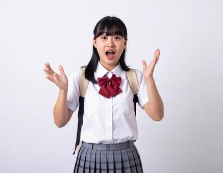 驚いた表情の女子生徒のイメージ 驚いた表情の女子生徒のイメージの写真