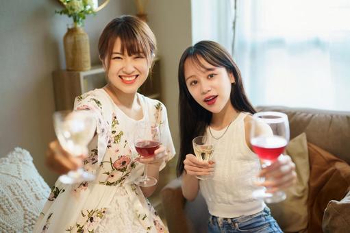 Two young women toasting, woman will be, home party, lunch, JPG