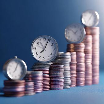 時間と硬貨で表す資産運用と投資計画 時間と硬貨で表す資産運用と投資計画の写真