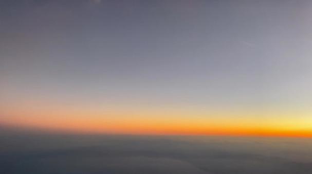 空から見た夕焼け 空から見た夕焼けの写真