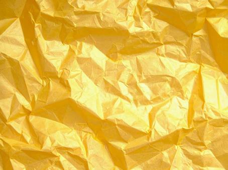 金色の紙の背景　AI生成画像　の写真