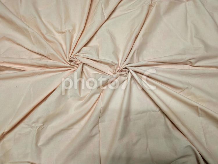 薄橙色の放射状の模様の壁紙 壁紙,高画質,グラデーションの写真素材
