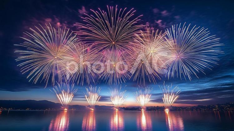 夕暮れ背景に日本の夏祭りの花火大会 花火,夏,花火大会の写真素材