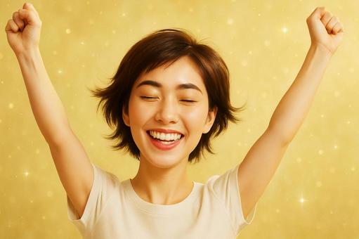 笑顔の女性が両手を挙げて喜ぶ表情2 笑顔の女性が両手を挙げて喜ぶ表情2の写真