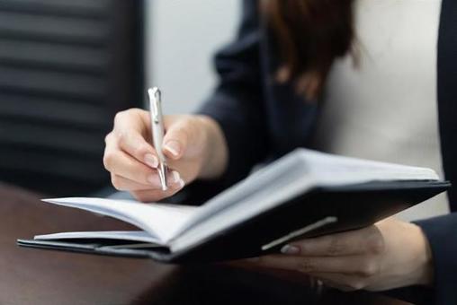 Business woman taking notes in a notebook, notebook, business woman, female, JPG