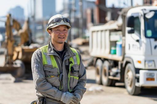 土木建設・工事現場で働く男性、労働者 土木建設・工事現場で働く男性、労働者の写真