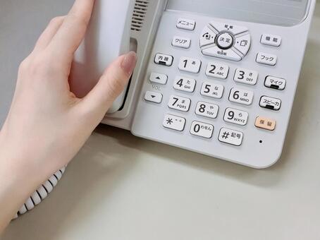 会社のボタン電話 ボタン電話,電話機,オフィスの写真素材