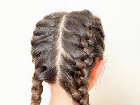 編み込み 編み込み 編み込み,ヘアスタイル,髪型の写真素材