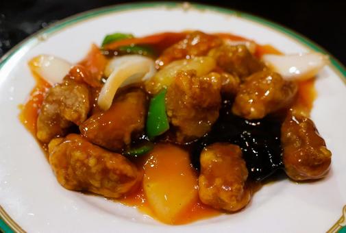 中華料理店の香港風酢豚 中華料理店の香港風酢豚 酢豚,豚肉,ピーマンの写真素材
