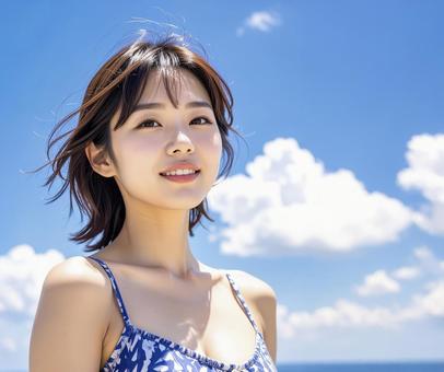 若い女性 夏の青空 若い女性 夏の青空の写真
