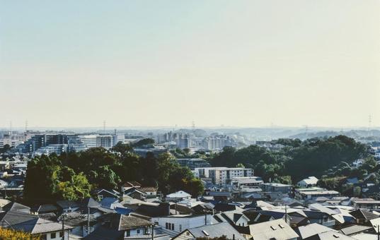 空と地平線と街並み 空,街並み,街の写真素材
