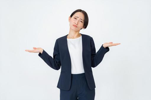 悩む女性 ビジネス,オフィス,案内の写真素材