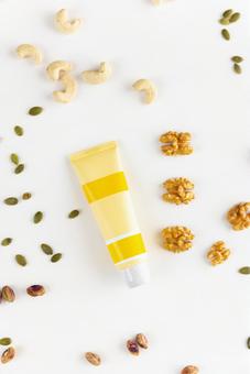Yellow tube with nuts, JPG Yellow tube with nuts, JPG