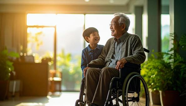 介護施設のシニア男性と見舞いに来た家族 介護施設のシニア男性と見舞いに来た家族の写真
