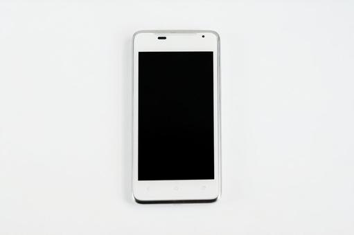 スマートフォンの白い本体 スマートフォンの白い本体の写真
