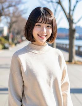冬・セーター姿の彼女は笑顔 冬・セーター姿の彼女は笑顔の写真