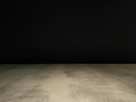 コンクリート風の床と黒い壁面 コンクリート風の床と黒い壁面の写真