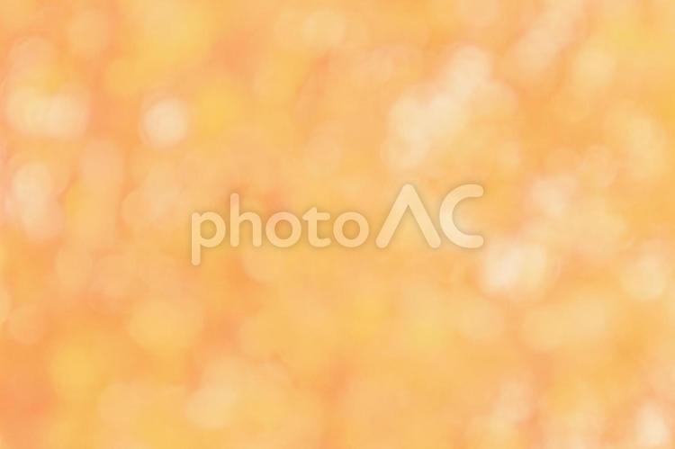 橙と黄色のきらきら背景 オレンジ,橙,橙色の写真素材