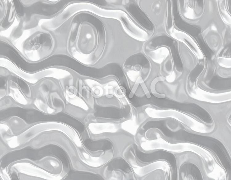銀色液体の波打つ光沢模様 銀色,液体,波紋の写真素材