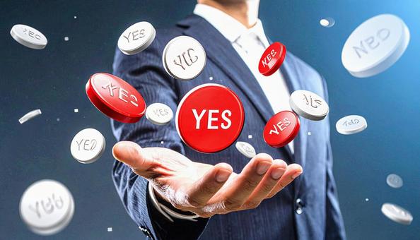 空中に浮かぶ「YES」を選ぶビジネスマン 空中に浮かぶ「YES」を選ぶビジネスマンの写真