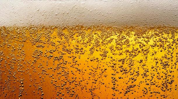 炭酸が弾けるビールの泡・飲み物・冷たい 炭酸が弾けるビールの泡・飲み物・冷たいの写真