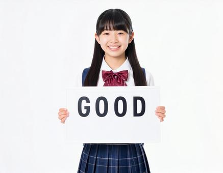 Goodと書いたボードを持つ女子生徒 Goodと書いたボードを持つ女子生徒の写真