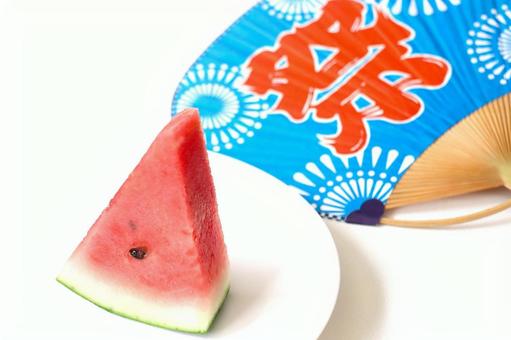 夏のイメージ　すいかとうちわ 夏,盛夏,夏のイメージの写真素材
