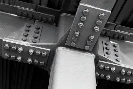 柱と鉄骨構造のボルトとナットの連結模様 鋼材,鉄骨,ナットの写真素材