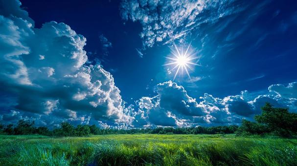 青い空と緑の草原が織りなす幻想的な風景 青い空と緑の草原が織りなす幻想的な風景の写真