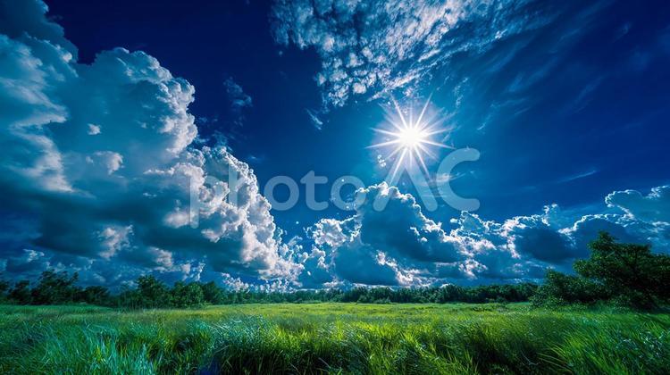 青い空と緑の草原が織りなす幻想的な風景 草原,青空,雲の写真素材