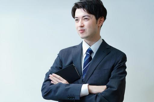 Young businessman posing with his arms crossed, businessman, male, good looking, JPG