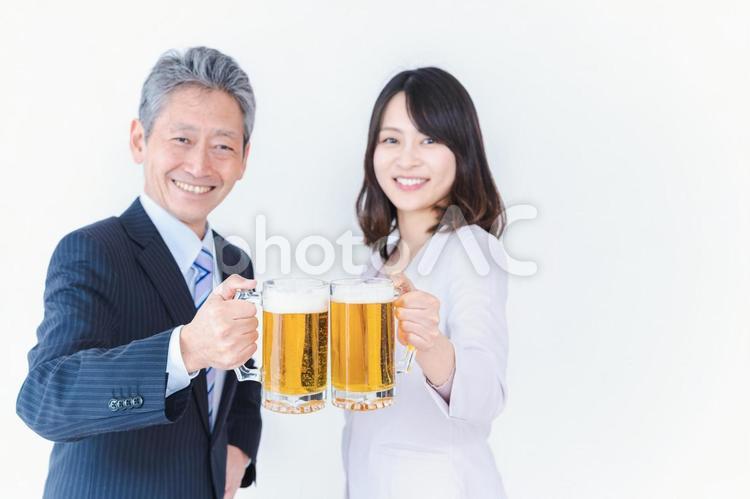 上司と乾杯をする女性社員 仕事,打ち上げ,男性の写真素材