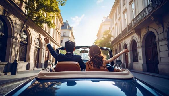 オープンカーに乗ってデートするカップル オープンカーに乗ってデートするカップル の写真
