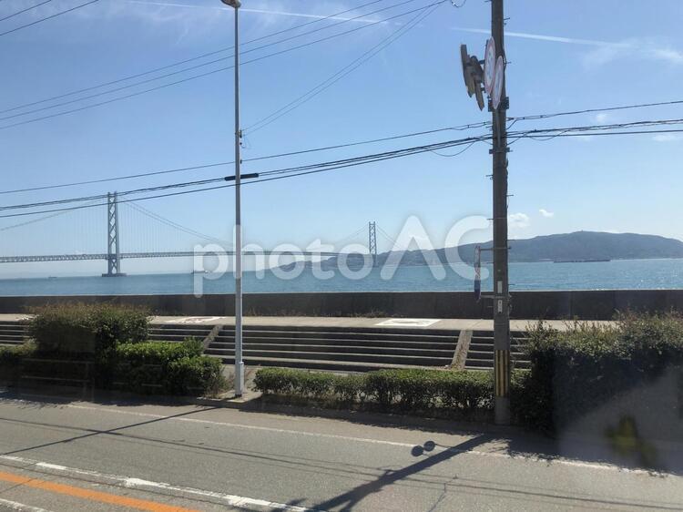 車窓から見える明石海峡大橋 明石海峡大橋,山陽電車,車窓からの写真素材