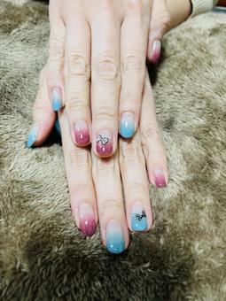 ジェルネイルリボン ジェルネイル,ネイルサロン,セルフネイルの写真素材