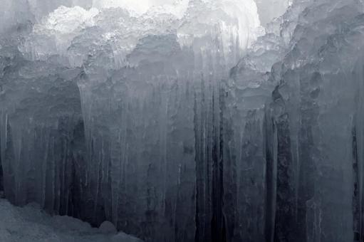 冬の氷柱と氷の壁のテクスチャ背景素材 氷柱,氷,冬の写真素材