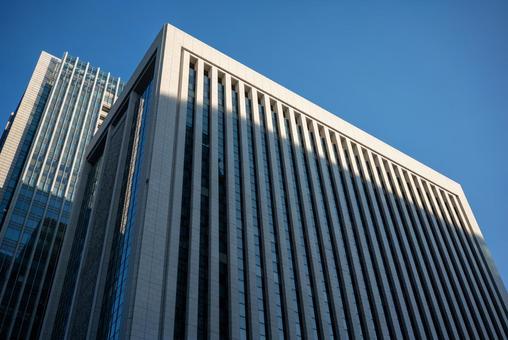 青空にそびえる都会のビル群 ビル,高層ビル,オフィスビルの写真素材