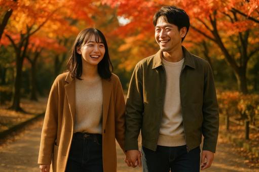 紅葉デートを楽しむ二人 紅葉デートを楽しむ二人の写真