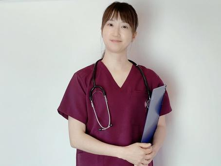 聴診器と看護師(医療従事者) 案内,受付,問診の写真素材