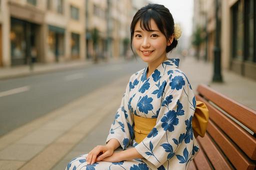 浴衣女性ベンチで微笑む 浴衣女性ベンチで微笑むの写真