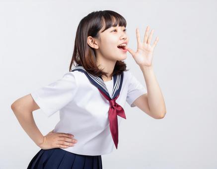 大声で声援を送る女子生徒のイメージ 大声で声援を送る女子生徒のイメージの写真