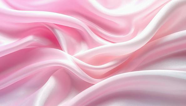 ピンクと白の波打つシルクのテクスチャの写真
